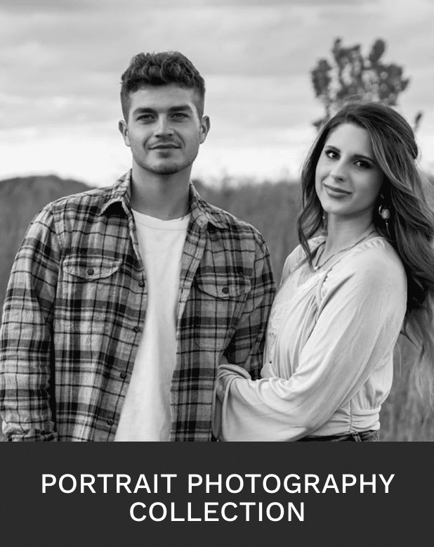 Black and white portrait of a smiling couple in outdoor attire, highlighting UA-Visions' photography artistry.